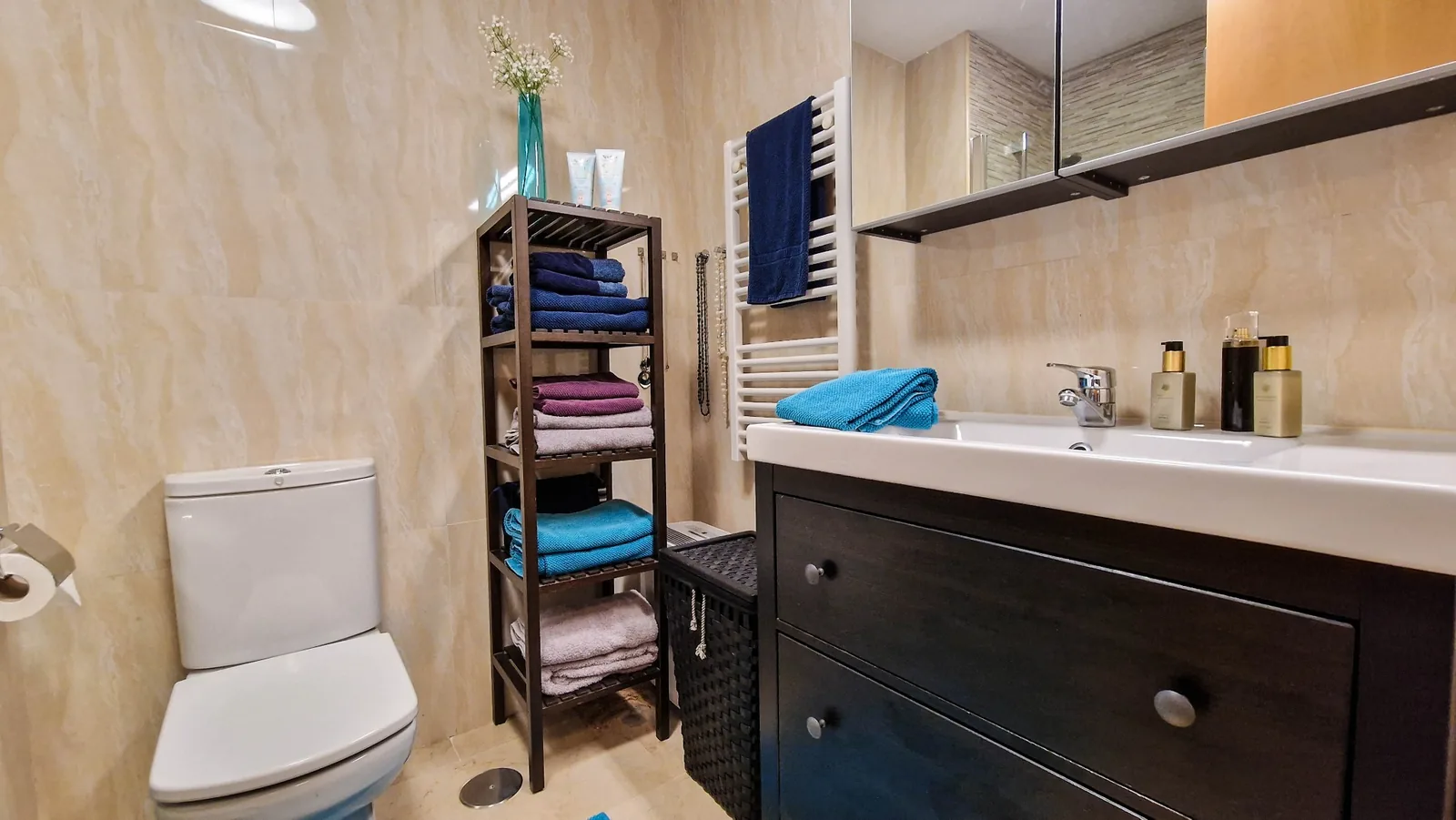 Bathroom with wide vanity unit